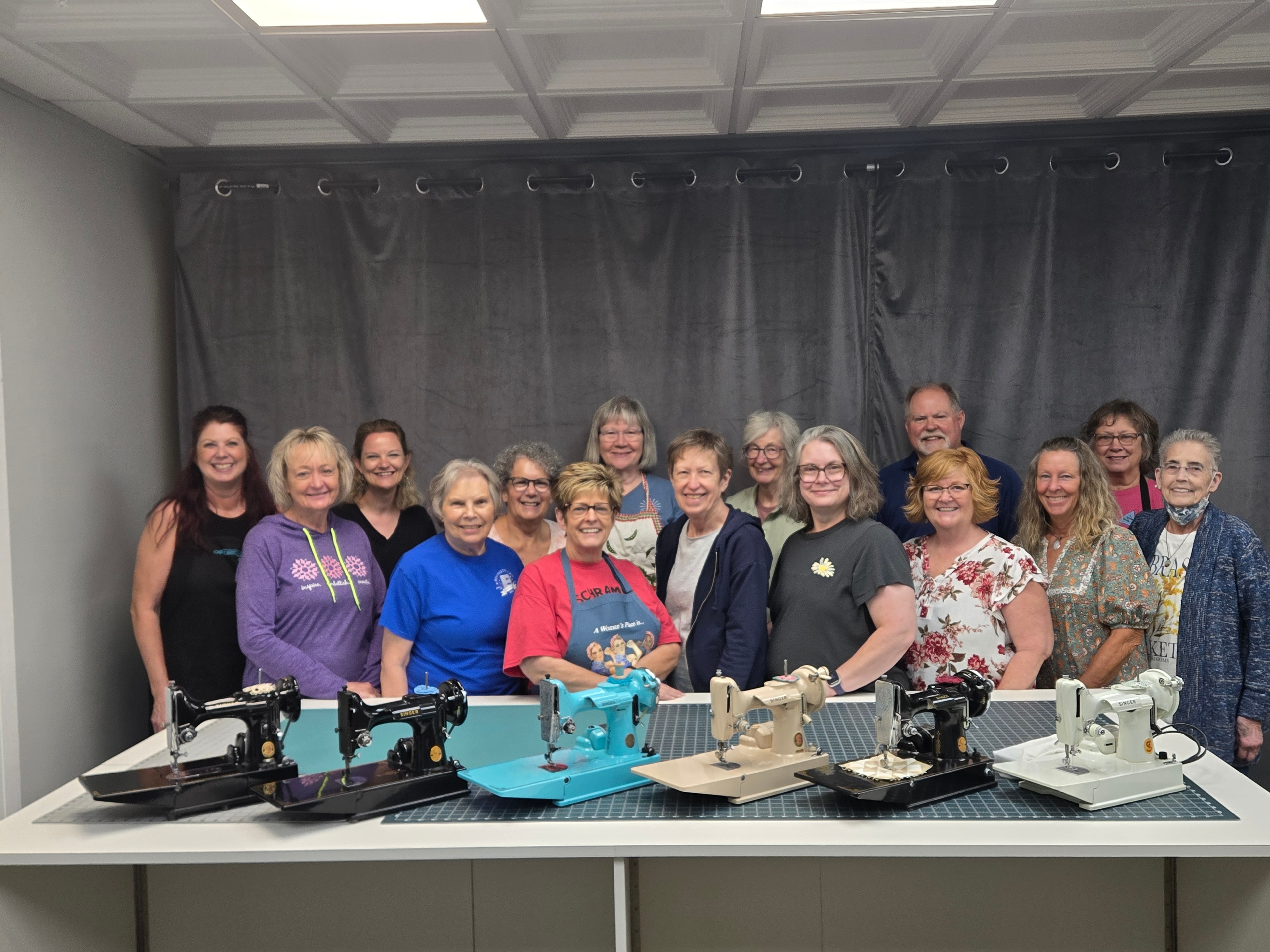 Workshop group photo — students with their Singer Featherweight machines