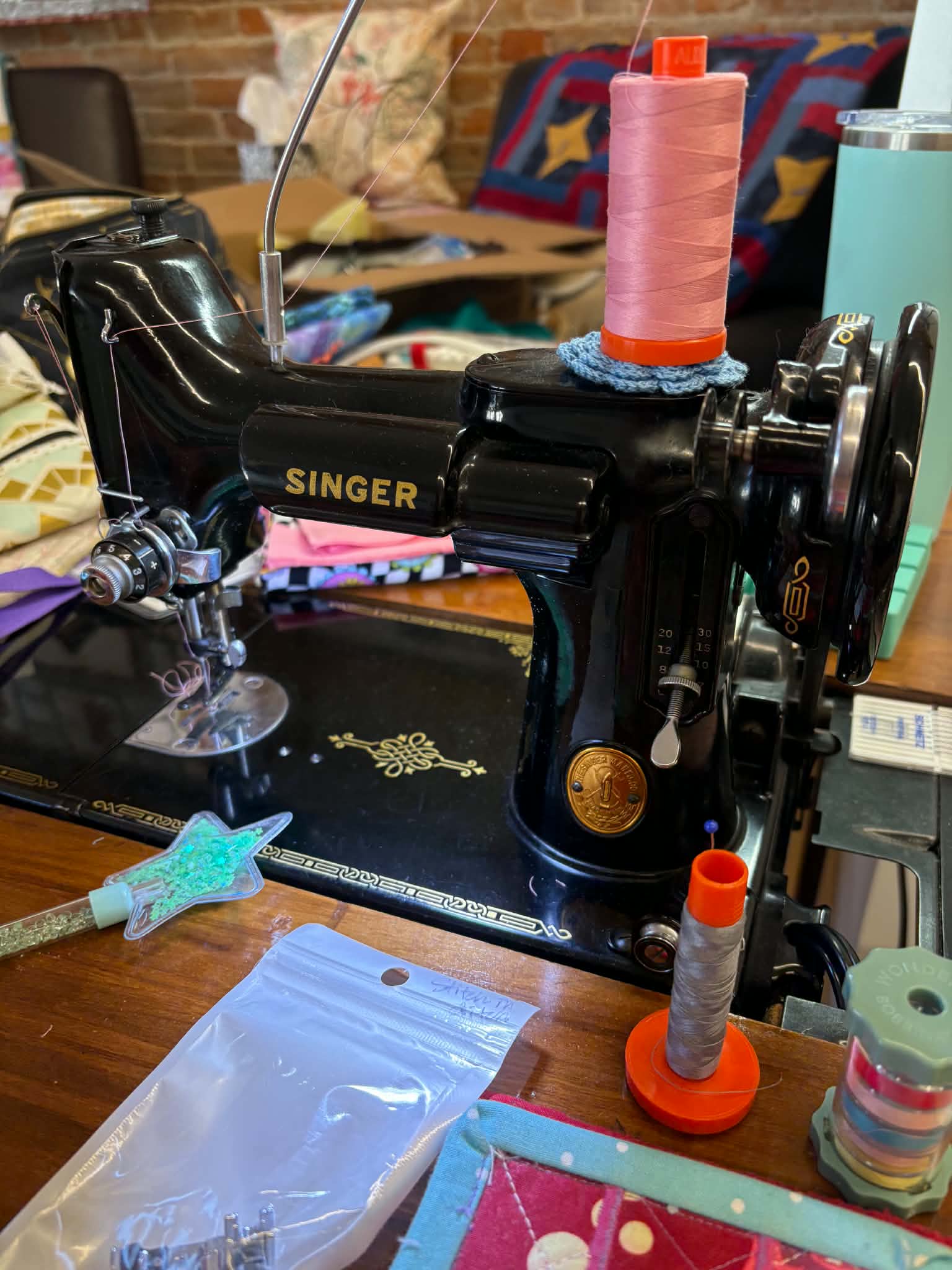 Vintage Singer Featherweight sewing machine in action at retreat
