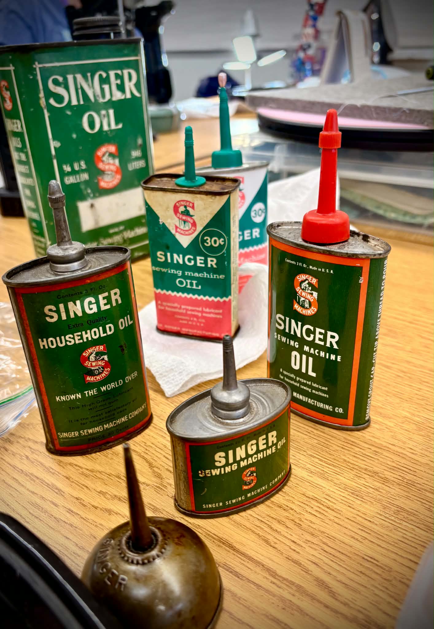 Vintage Singer oil cans collection at retreat