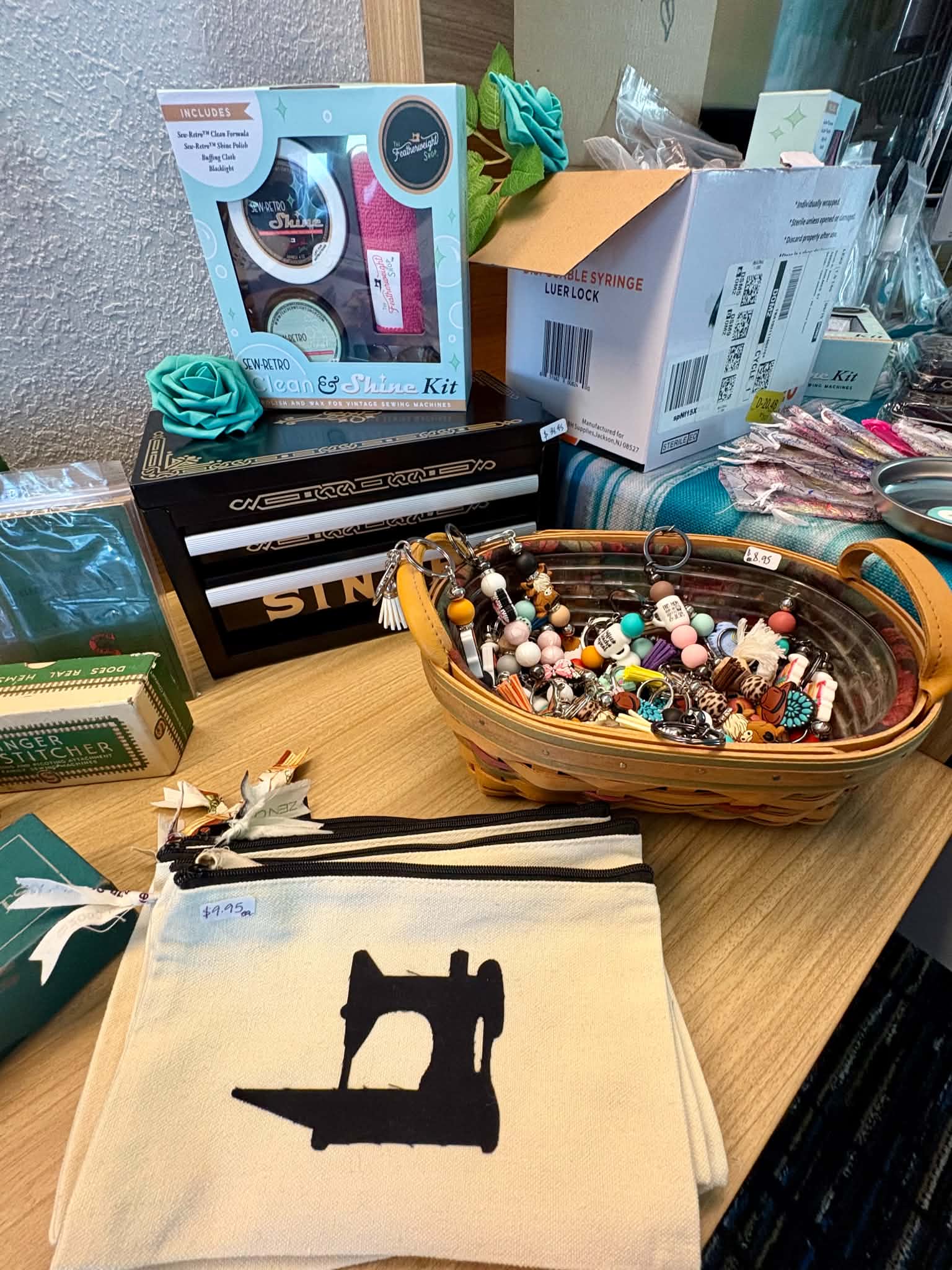 Retreat vendor table with Sew-Retro Clean & Shine kits and sewing accessories